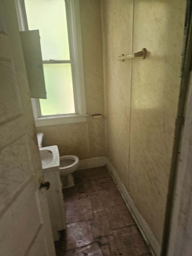 605 E 92nd Pl, Chicago, IL 60619 - bathroom featuring brick flooring and toilet