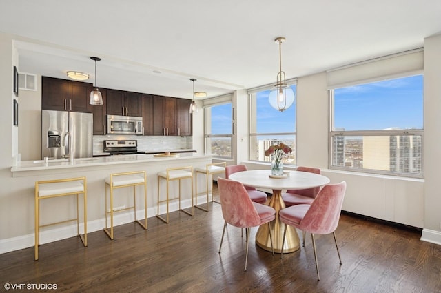 2626 N Lakeview Ave Unit 2012, Chicago, IL 60614 - dining room with dark wood-type flooring and baseboards