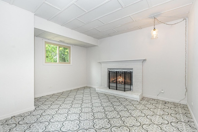 3020 Timber Hill Ct, Aurora, IL 60504 - unfurnished living room featuring a brick fireplace and baseboards