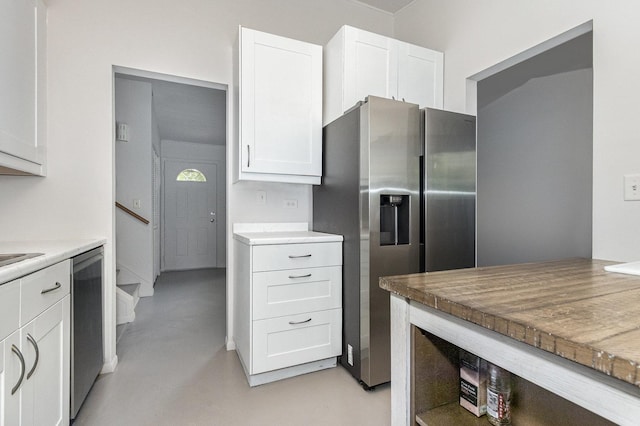 3020 Timber Hill Ct, Aurora, IL 60504 - kitchen featuring appliances with stainless steel finishes, concrete floors, and white cabinetry