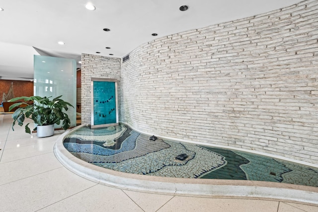 6301 N Sheridan Rd Unit 7N, Chicago, IL 60660 - interior space with brick wall and recessed lighting