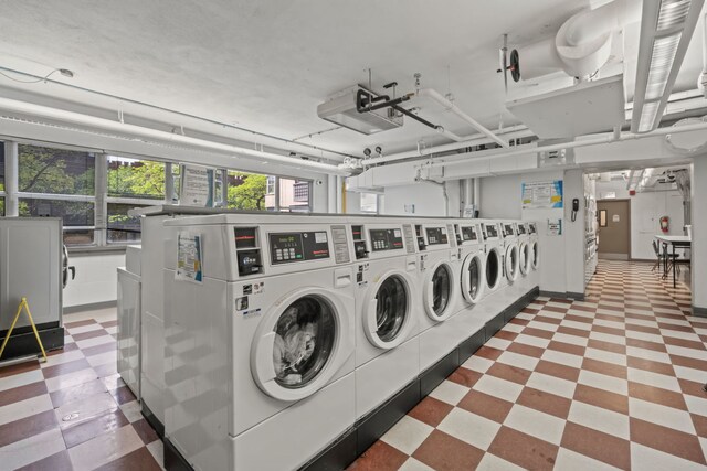 6301 N Sheridan Rd Unit 7N, Chicago, IL 60660 - community laundry room featuring washing machine and dryer and tile patterned floors