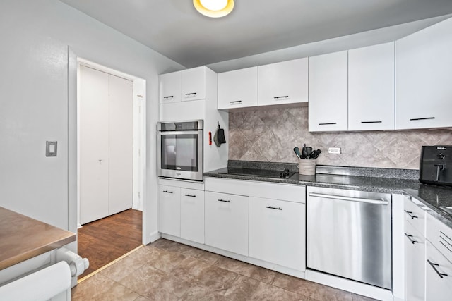 6301 N Sheridan Rd Unit 7N, Chicago, IL 60660 - kitchen with appliances with stainless steel finishes, white cabinetry, and decorative backsplash