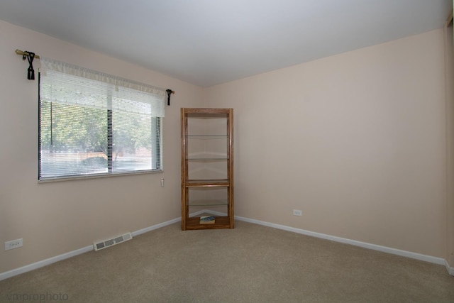 771 E Devon Ave, Roselle, IL 60172 - unfurnished room featuring carpet flooring and baseboards