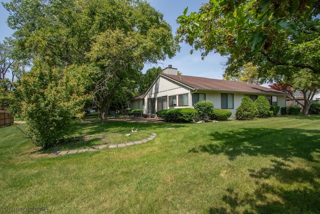 771 E Devon Ave, Roselle, IL 60172 - single story home featuring a chimney and a front lawn