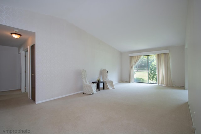 771 E Devon Ave, Roselle, IL 60172 - carpeted spare room with vaulted ceiling