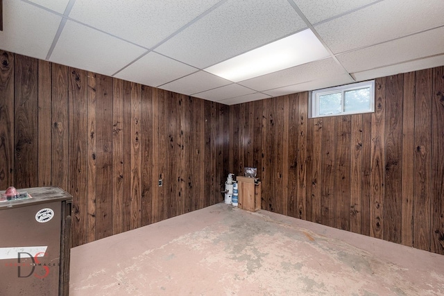 305 W 3rd St, Streator, IL 61364 - basement with wood walls and a paneled ceiling