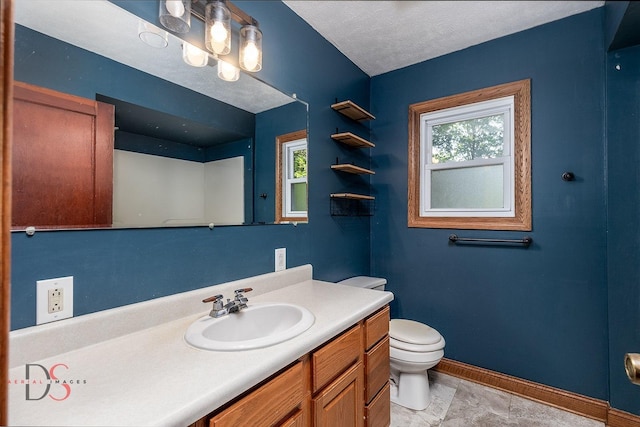 305 W 3rd St, Streator, IL 61364 - bathroom with vanity and plenty of natural light