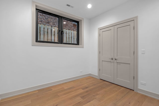 1646 N Orchard St Unit 1S, Chicago, IL 60614 - unfurnished bedroom with light wood-style flooring and a closet