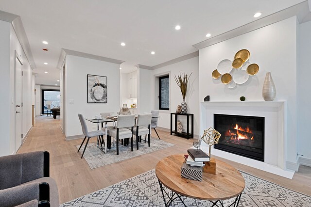 1646 N Orchard St Unit 1S, Chicago, IL 60614 - dining room with light wood-style floors, recessed lighting, and a glass covered fireplace