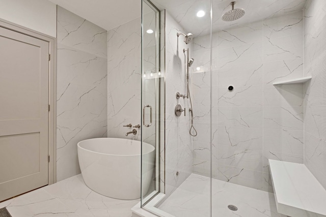 1646 N Orchard St Unit 1S, Chicago, IL 60614 - bathroom with a marble finish shower, a freestanding bath, and marble finish flooring