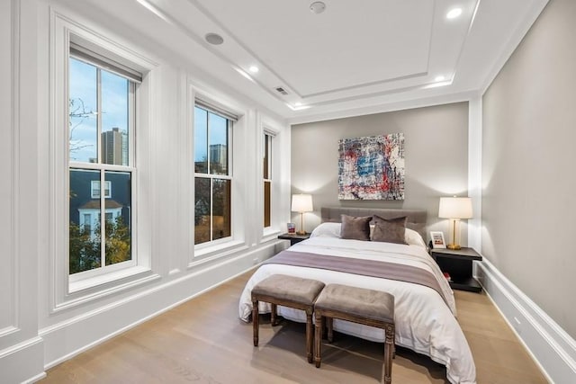 1942 N Sedgwick St Unit Ph, Chicago, IL 60614 - bedroom featuring wood finished floors, a tray ceiling, and recessed lighting