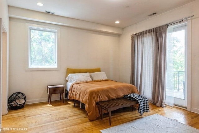 6640 S Maryland Ave Unit 2, Chicago, IL 60637 - bedroom featuring light wood finished floors, recessed lighting, and access to outside