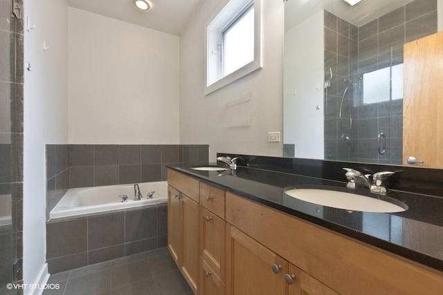 6640 S Maryland Ave Unit 2, Chicago, IL 60637 - full bathroom featuring double vanity, a garden tub, tile patterned flooring, and a stall shower