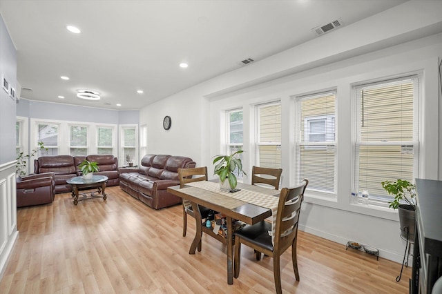 10554 S State St, Chicago, IL 60628 - dining room with healthy amount of natural light, light wood finished floors, and recessed lighting