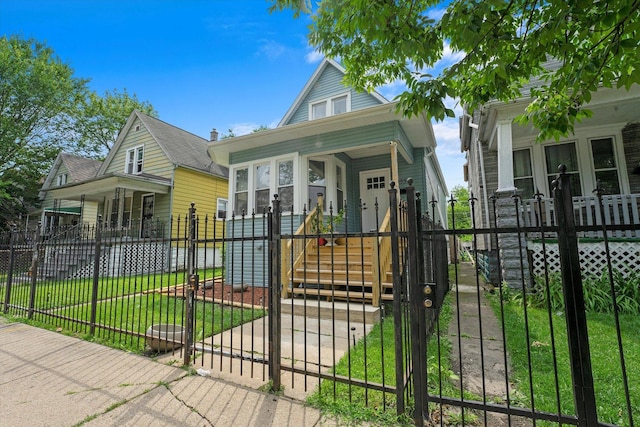 10554 S State St, Chicago, IL 60628 - view of front of house featuring a gate and a fenced front yard