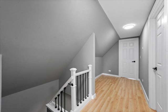 10554 S State St, Chicago, IL 60628 - corridor with an upstairs landing and light wood finished floors