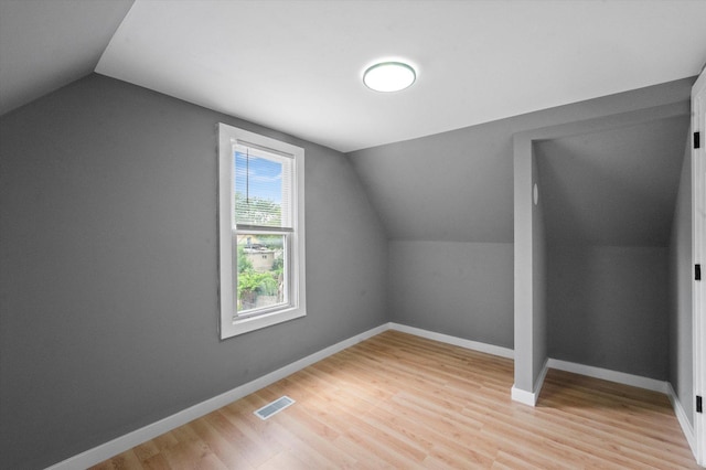 10554 S State St, Chicago, IL 60628 - additional living space featuring lofted ceiling and light wood finished floors