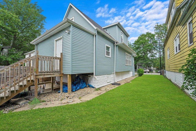 10554 S State St, Chicago, IL 60628 - view of property exterior with a yard