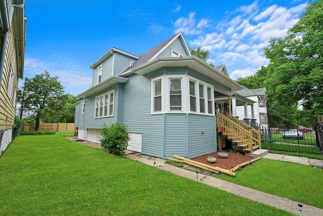 10554 S State St, Chicago, IL 60628 - view of side of property featuring an attached garage