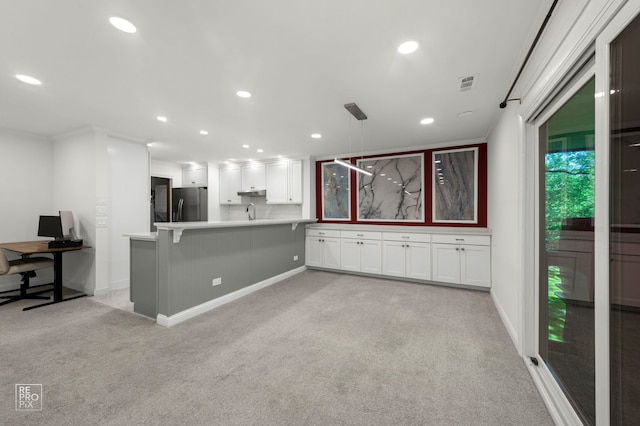 11210 Sycamore Ln Unit 61D, Palos Hills, IL 60465 - kitchen featuring light colored carpet, stainless steel refrigerator, white cabinets, light countertops, and recessed lighting