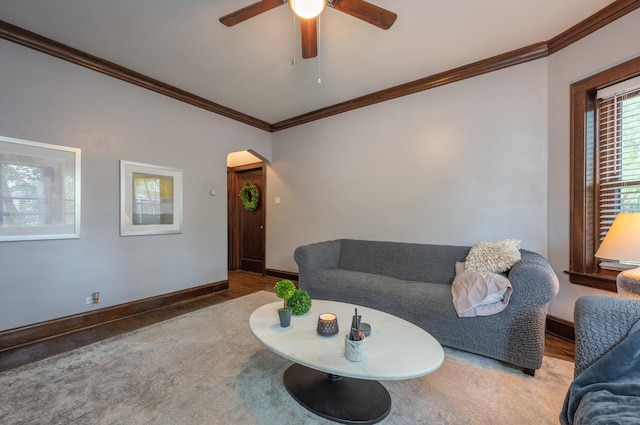 4018 N Maplewood Ave, Chicago, IL 60618 - living room featuring ornamental molding, wood finished floors, arched walkways, and ceiling fan