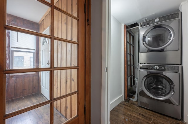 4018 N Maplewood Ave, Chicago, IL 60618 - laundry area featuring stacked washer and clothes dryer and dark wood-style floors
