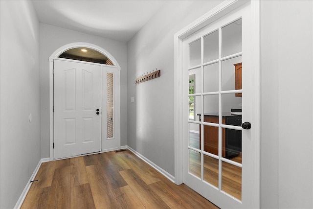 21649 Kent Ct, Frankfort, IL 60423 - entryway featuring dark wood-type flooring and baseboards