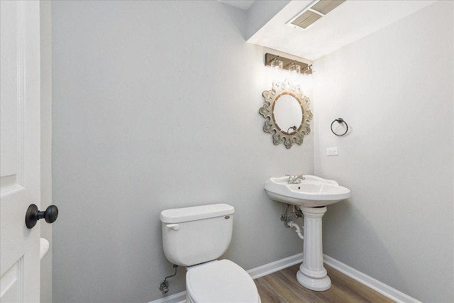 21649 Kent Ct, Frankfort, IL 60423 - half bath with toilet and wood finished floors