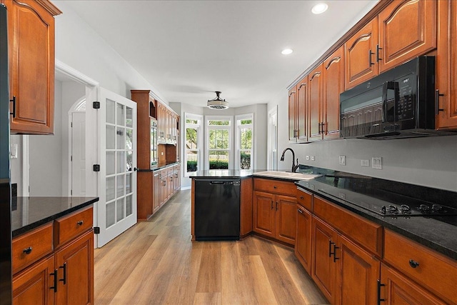 21649 Kent Ct, Frankfort, IL 60423 - kitchen with black appliances, light wood finished floors, a peninsula, brown cabinets, and recessed lighting