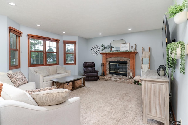 807 Eddy Rd, Bloomington, IL 61704 - carpeted living room featuring recessed lighting and a fireplace