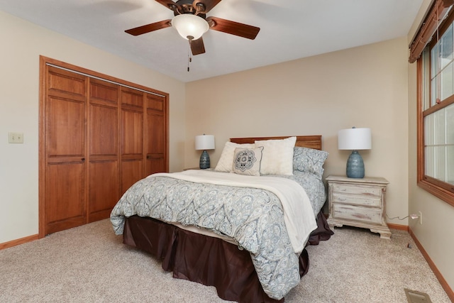 807 Eddy Rd, Bloomington, IL 61704 - carpeted bedroom featuring a closet and ceiling fan
