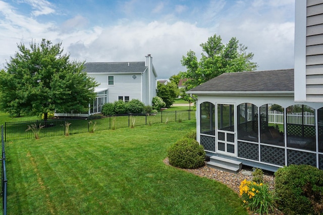 807 Eddy Rd, Bloomington, IL 61704 - fenced backyard with a sunroom