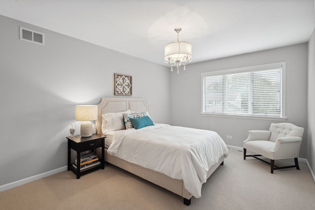 1923 N Carlyle Pl, Arlington Heights, IL 60004 - carpeted bedroom with a chandelier and baseboards