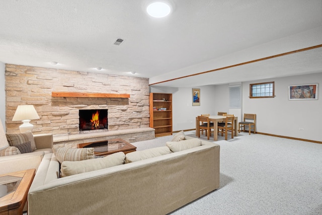 1923 N Carlyle Pl, Arlington Heights, IL 60004 - carpeted living room featuring a stone fireplace and a textured ceiling