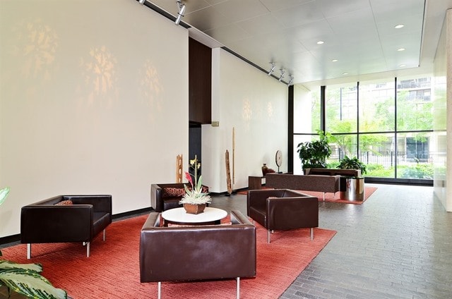 1560 N Sandburg Ter Unit 915, Chicago, IL 60610 - lobby with expansive windows and recessed lighting