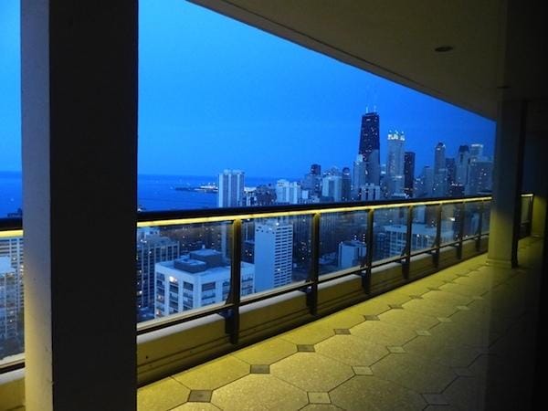 1560 N Sandburg Ter Unit 915, Chicago, IL 60610 - balcony featuring a skyline view and a water view
