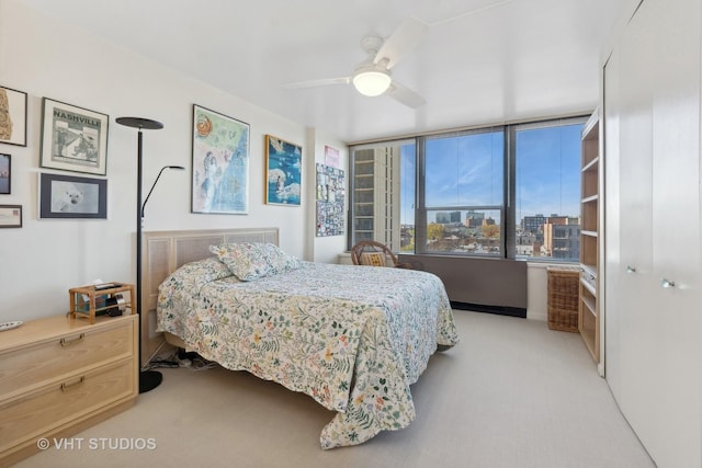 1560 N Sandburg Ter Unit 915, Chicago, IL 60610 - bedroom with light colored carpet and ceiling fan