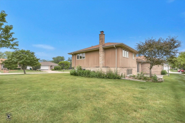 8820 Meadowview Dr, Orland Hills, IL 60487 - view of side of property with a chimney and a lawn