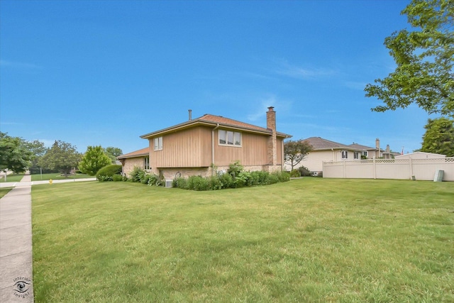 8820 Meadowview Dr, Orland Hills, IL 60487 - view of side of property featuring a chimney