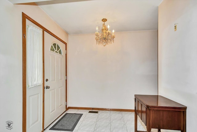 8820 Meadowview Dr, Orland Hills, IL 60487 - foyer entrance with a chandelier and baseboards