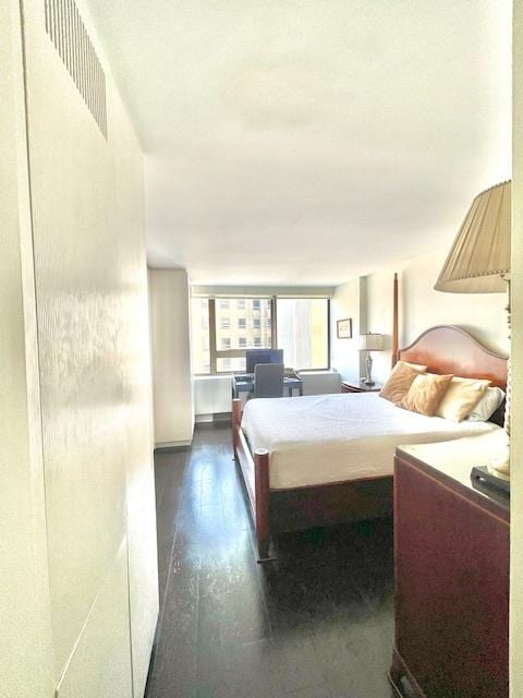 2800 N Lake Shore Dr Unit 1417, Chicago, IL 60657 - bedroom with dark wood-type flooring