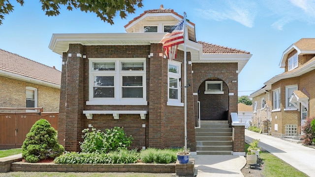 1836 Cuyler Ave, Berwyn, IL 60402 - view of front of property with a tiled roof and brick siding