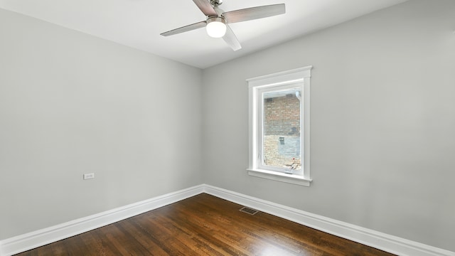 1836 Cuyler Ave, Berwyn, IL 60402 - empty room featuring dark wood-style flooring and a ceiling fan