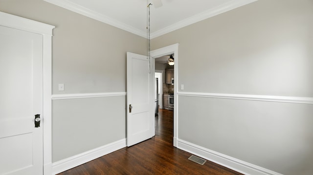 1836 Cuyler Ave, Berwyn, IL 60402 - spare room with ceiling fan, dark wood finished floors, and ornamental molding