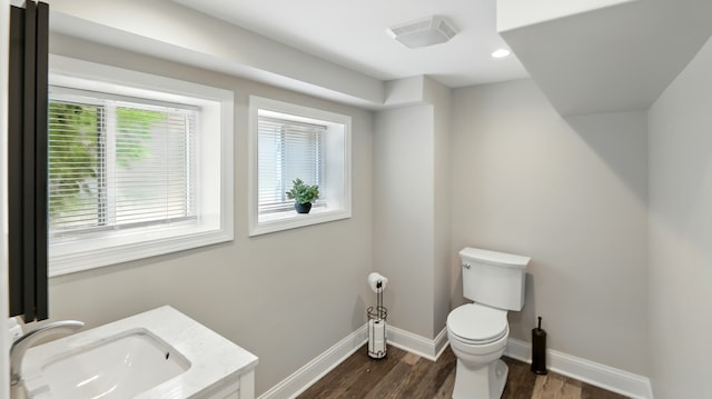 1836 Cuyler Ave, Berwyn, IL 60402 - bathroom featuring wood finished floors, vanity, and recessed lighting