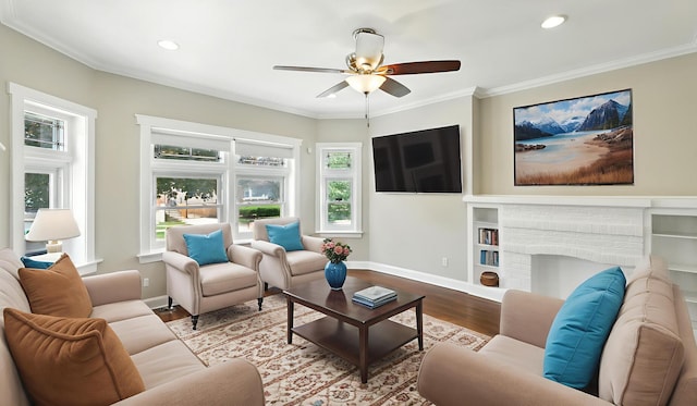 1836 Cuyler Ave, Berwyn, IL 60402 - living area featuring healthy amount of natural light, wood finished floors, a ceiling fan, ornamental molding, and recessed lighting