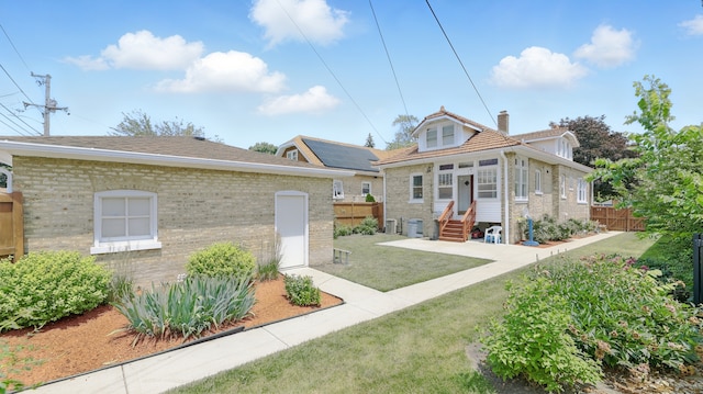 1836 Cuyler Ave, Berwyn, IL 60402 - bungalow featuring brick siding, entry steps, and a chimney