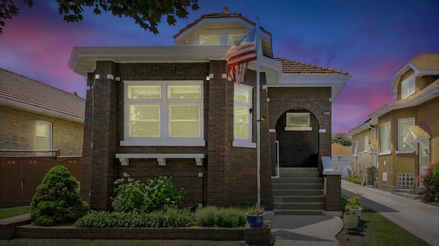 1836 Cuyler Ave, Berwyn, IL 60402 - view of front of home with a tile roof and brick siding