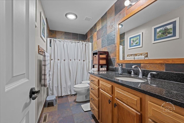 4756 Flanders Ct, Plainfield, IL 60586 - full bathroom with vanity, stone finish flooring, a shower with shower curtain, and tile walls